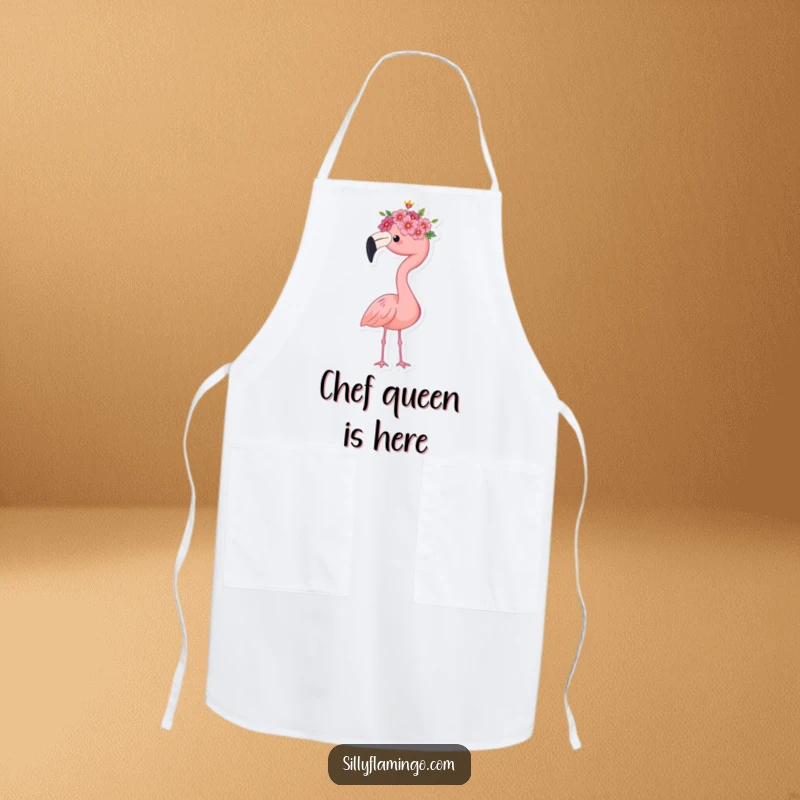 Funny flamingo apron for chefs, wearing a tiny flower crown, standing proudly, a whimsical and practical kitchen accessory for adding regal fun, a great gift.