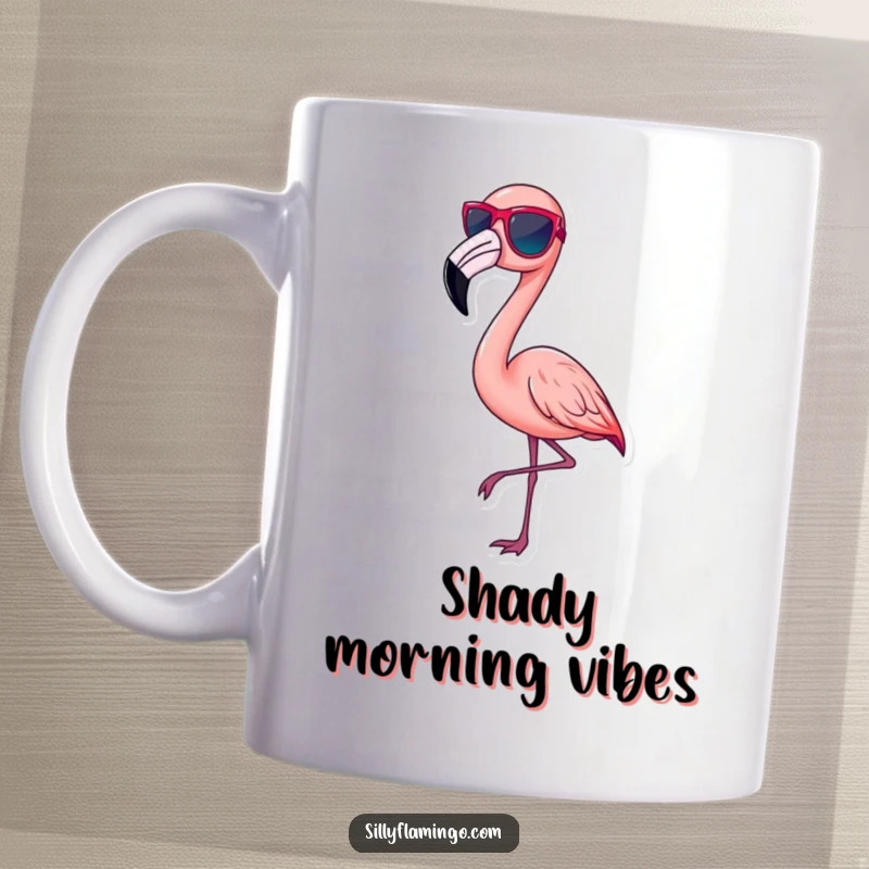 Funny pink flamingo mug, wearing tiny sunglasses, striking a chic pose, embodying cool confidence, a perfect funny gift.