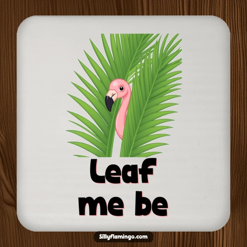 Funny flamingo peeking from a green palm leaf on a protective drink coaster, adding a humorous tropical vibe.