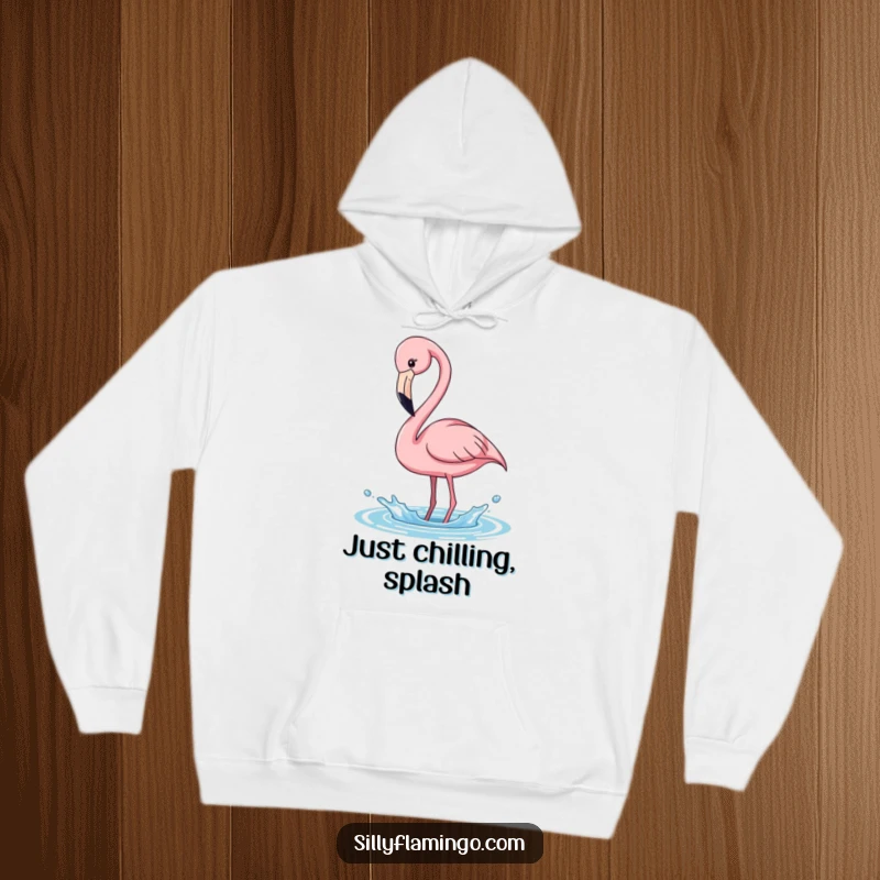 Funny pink flamingo hoodie, playfully bending its long neck to splash water, radiating cheerful energy, a warm funny gift.