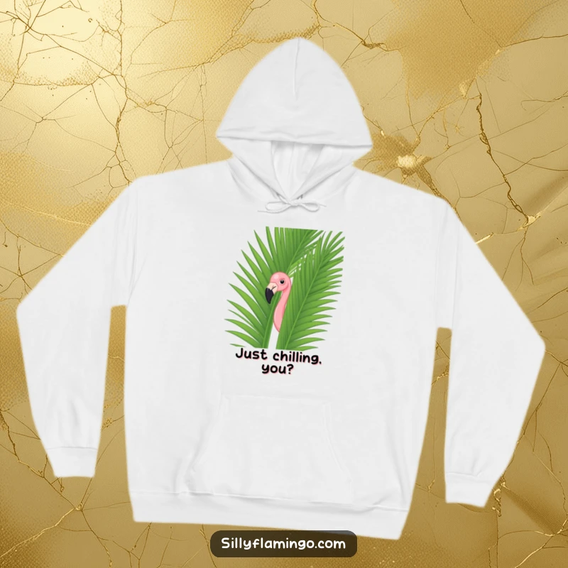 Funny flamingo peeking mischievously from a vibrant green palm leaf on a soft, cozy hoodie for ultimate comfort.