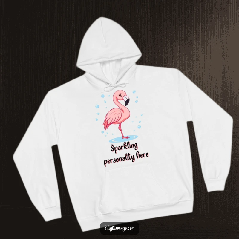Funny flamingo with a cheerful wink, surrounded by sparkling water drops on a warm, cozy hoodie.