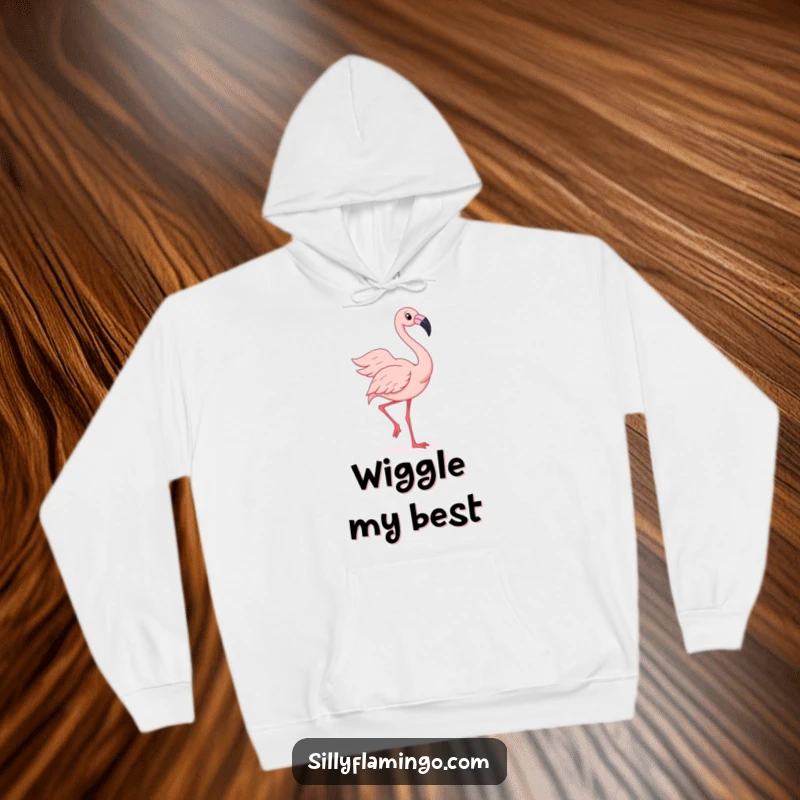 Funny hoodie depicting a joyful flamingo doing a silly wiggle with its fanned-out feathers, perfect for cozying up and dancing.