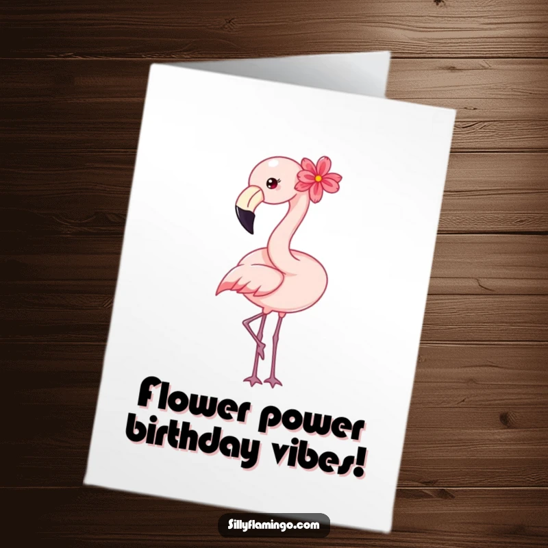 Funny Free Printable Birthday Card showing a happy flamingo with a flower, playfully bobbing its head.