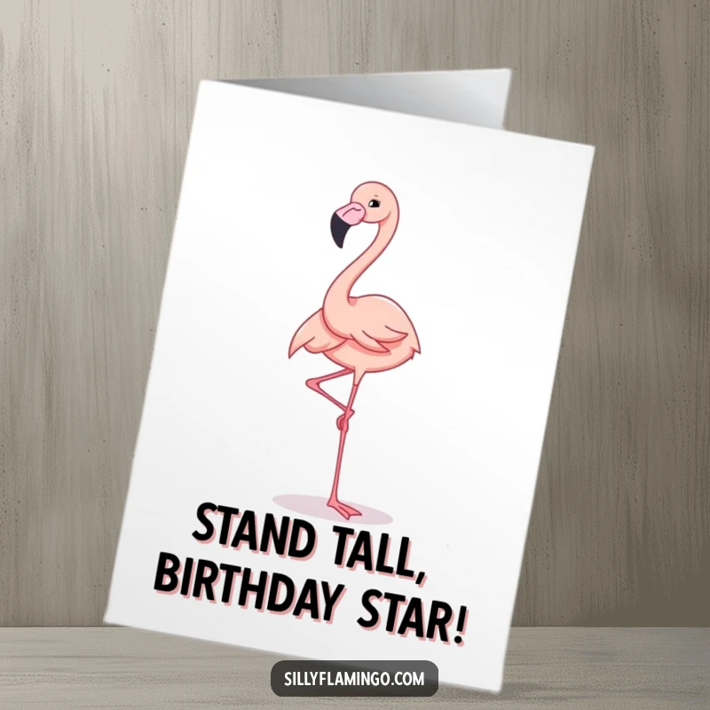 Funny free printable birthday card featuring a flamingo elegantly balancing on one leg with a big, cheerful expression.