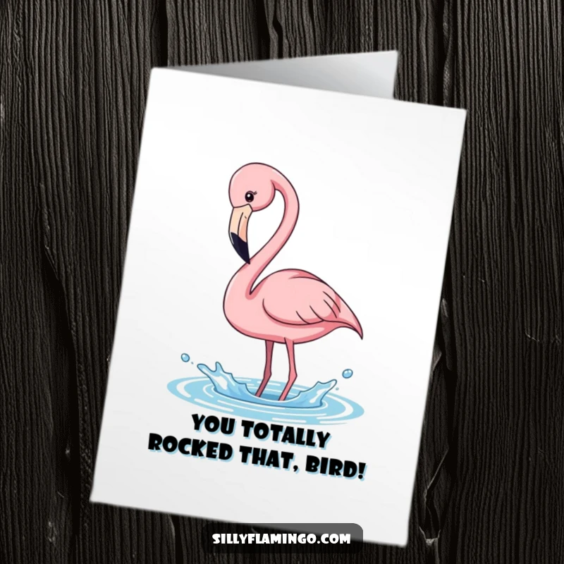 Funny Free Printable Congrats Card: A lively pink flamingo playfully bending its long neck to create a delightful splash in the water.
