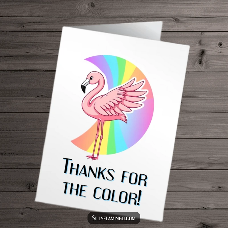 Funny Free Printable Thank You Card: A flamingo crafts a vibrant rainbow, offering colorful thanks.