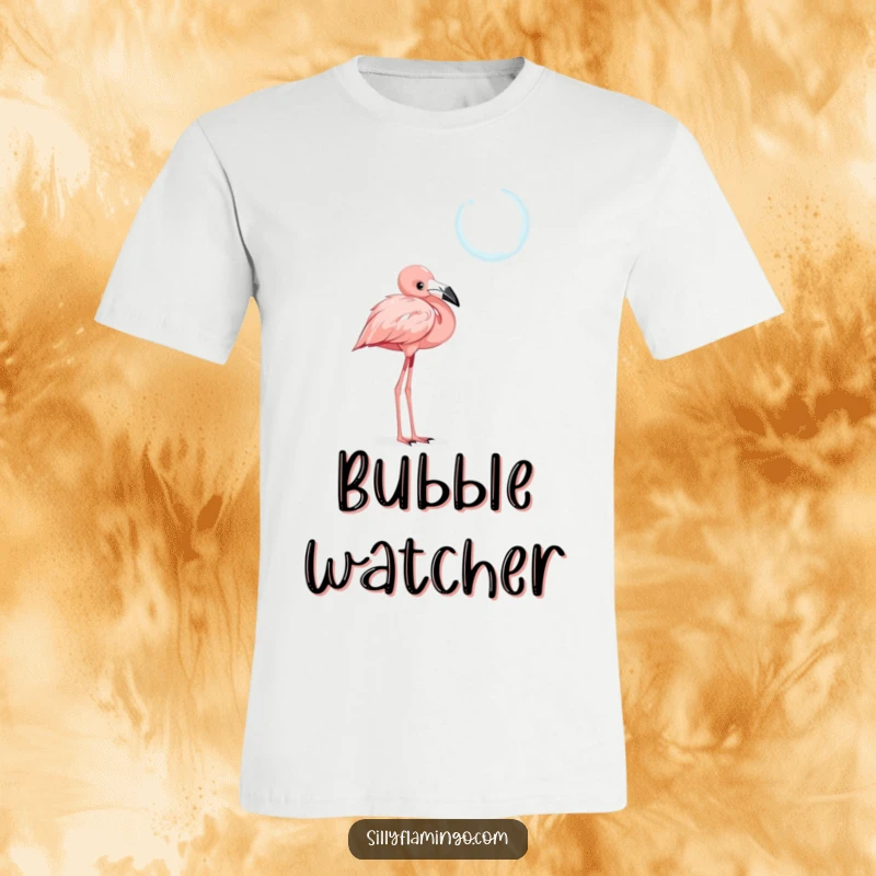 Funny t-shirt depicting a curious flamingo with its head tilted, gazing intently at a shimmering, iridescent floating bubble.