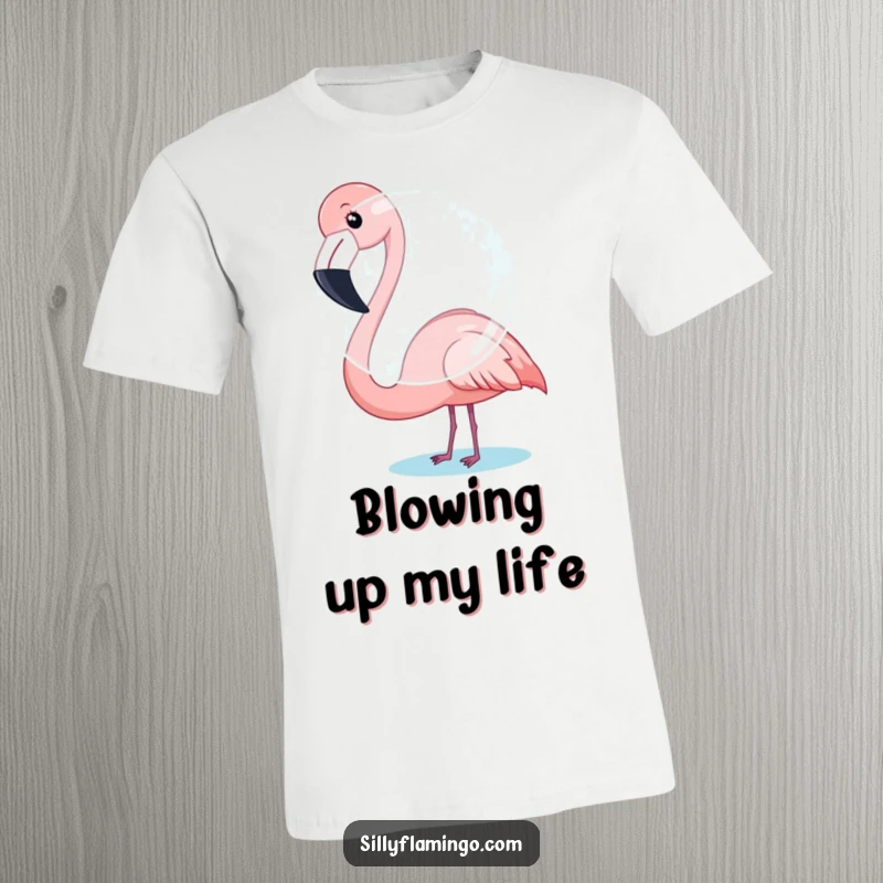 Funny Flamingo T-Shirt: A flamingo is shown with puffed cheeks, humorously attempting to blow a giant bubble.