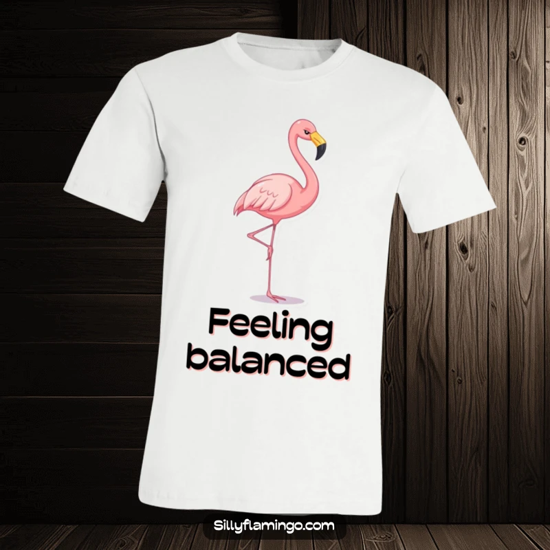Funny flamingo t-shirt featuring a cheerful flamingo balancing on one leg, perfect for bird watchers and fashionistas.
