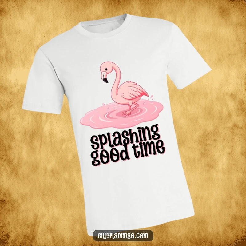 Funny flamingo t-shirt featuring a joyful bird splashing playfully in a bright pink water puddle, radiating happiness.