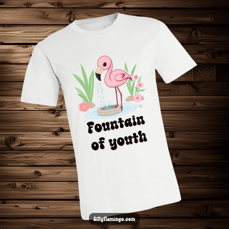 Funny T-Shirt depicting a flamingo playfully spraying water from its beak, forming a small, joyful fountain.