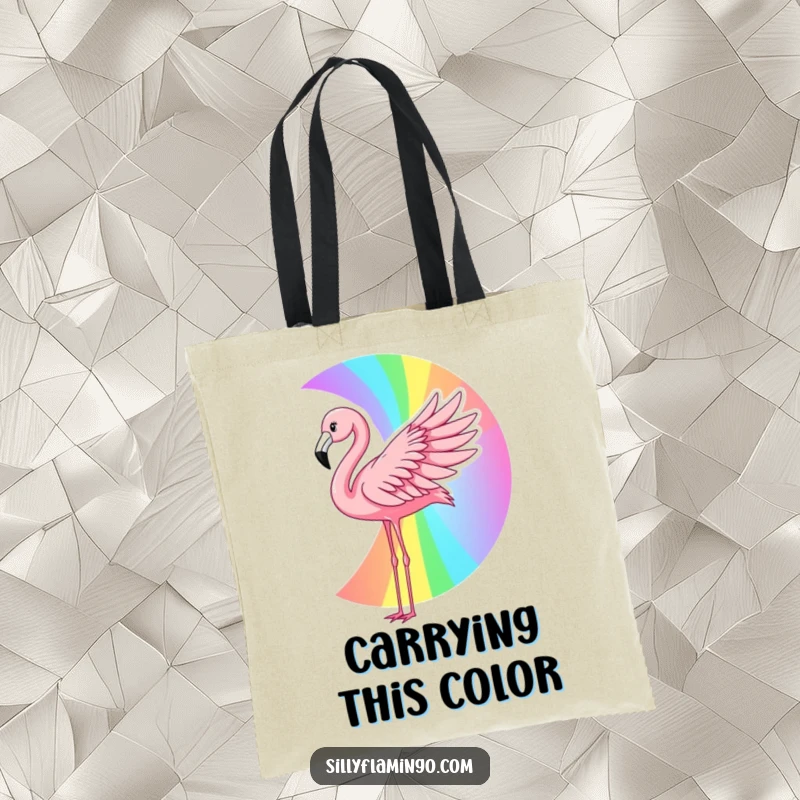 Funny flamingo tote bag depicting a pink bird creating a rainbow with its wing, perfect for carrying items with a humorous and artistic flair.